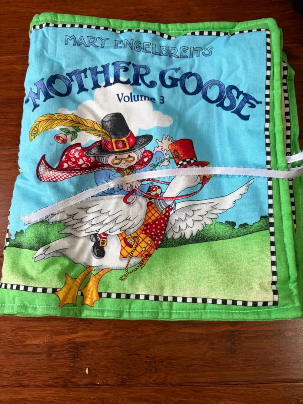 Mary Engelbreit Mother Goose Fabric Cover – Blue, Green & Yellow Accents